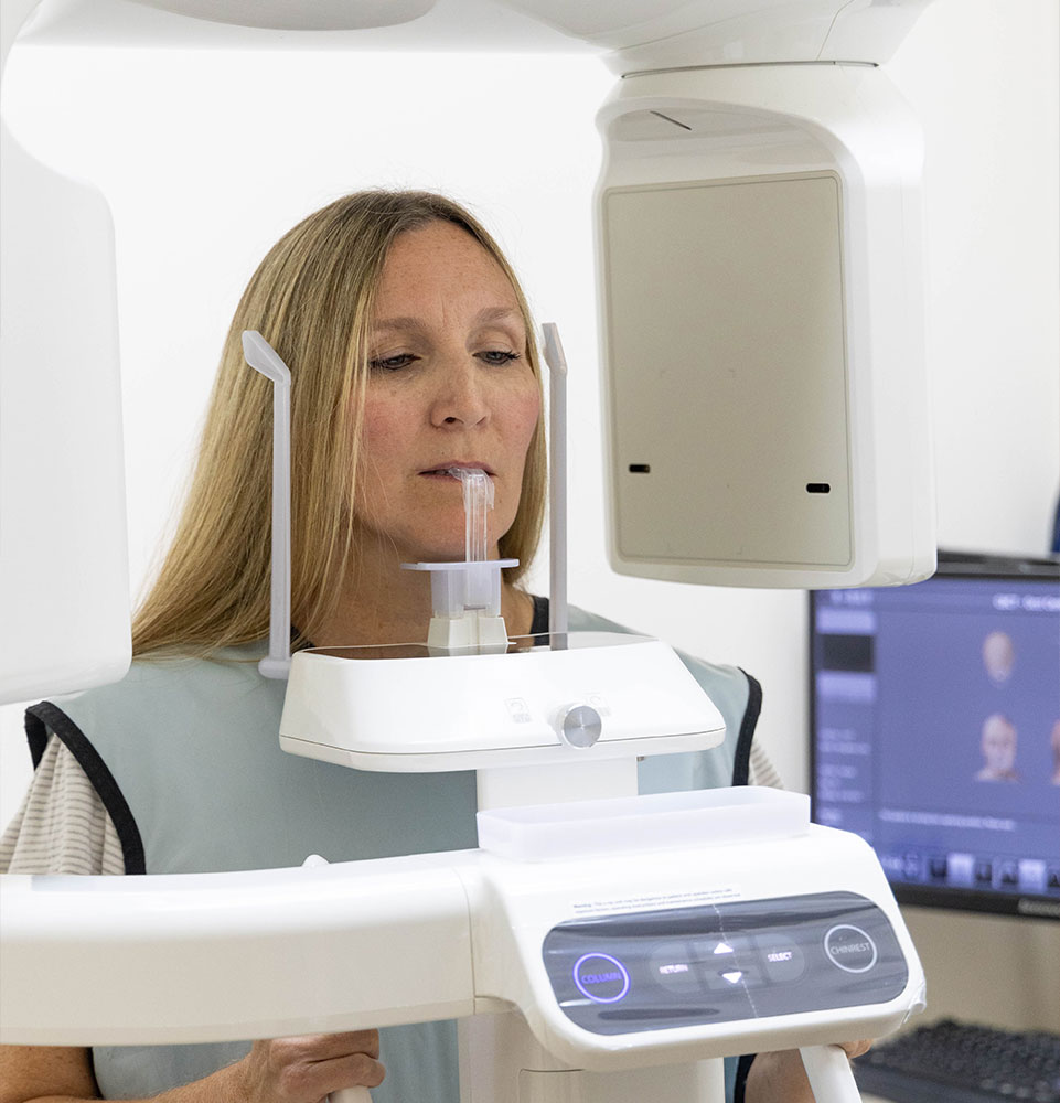 patient getting x-ray of teeth