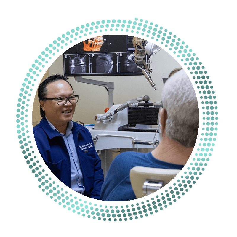 Dr. Truong talking to patient about oral surgery